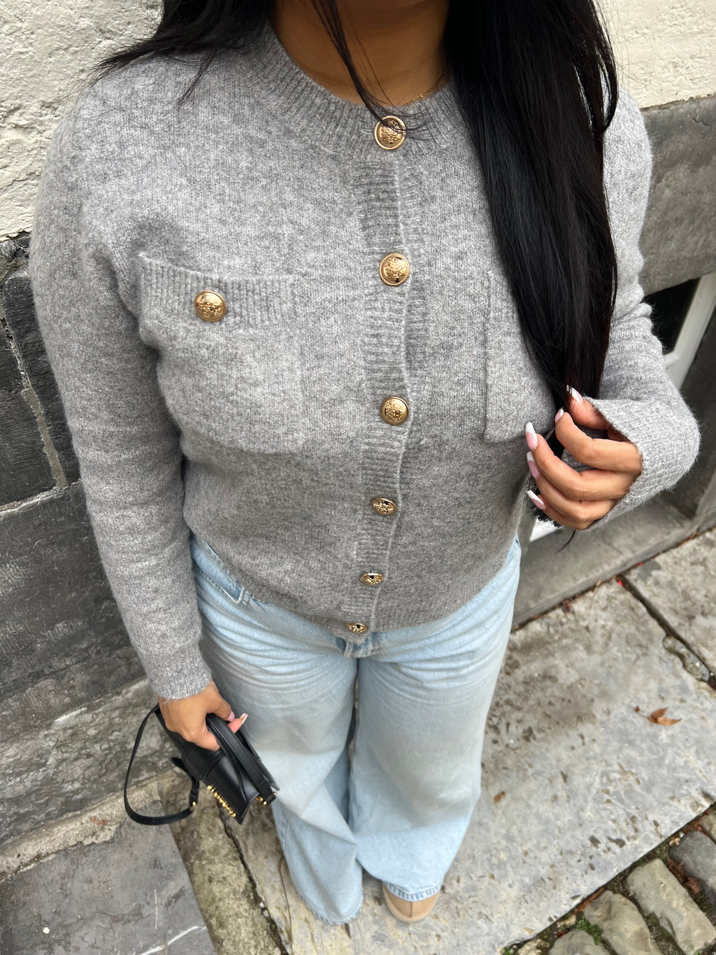 Luxe trui met knopen